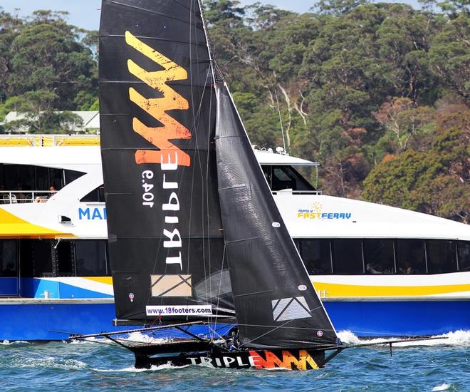 Triple M races the Manly Ferry on the way to victory in Race 7 of the 18ft Skiffs Spring Championship ©  Frank Quealey / Australian 18 Footers League